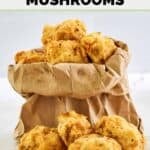 A small paper bag filled with homemade Fat Ronnie's deep fried mushrooms.
