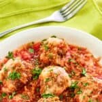 A bowl of copycat Olive Garden meatballs parmigiana.