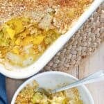 Copycat Black-eyed Pea yellow squash casserole in a baking dish and small bowl.