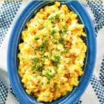 Homemade Brookville Hotel creamed corn in a dish on a kitchen towel.