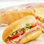 Homemade Kmart sub sandwich half on parchment paper.