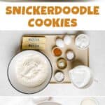 Homemade snickerdoodle cookies on a plate and the ingredients on a tray.