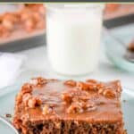 A slice of Texas sheet cake and a glass of milk.