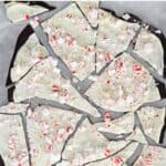 Homemade Williams-Sonoma peppermint bark candy on parchment paper.