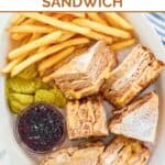 Homemade Bennigan's monte cristo and the slices sandwich served with jam and fries.