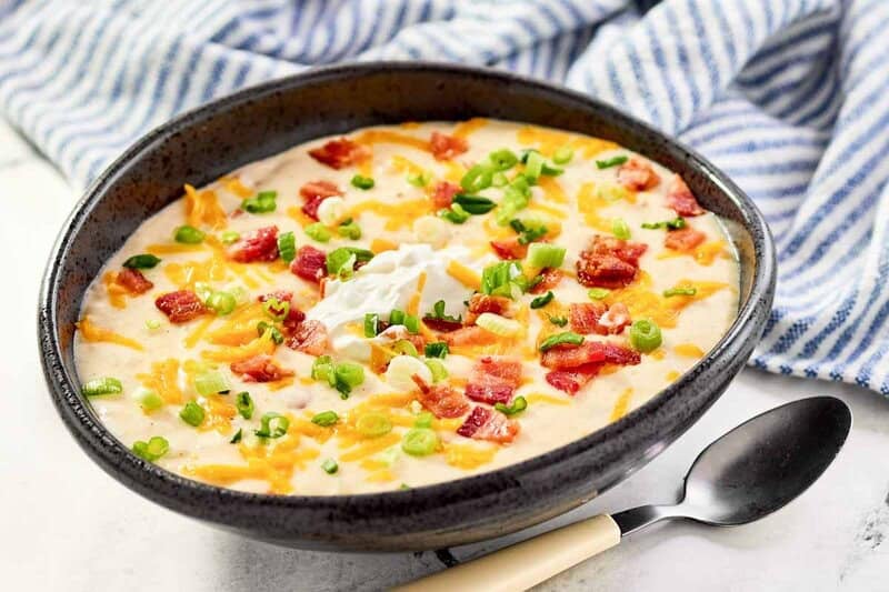 A bowl of copycat Black Angus Steakhouse baked potato soup.