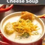 Homemade Black-eyed Pea broccoli cheese soup topped with shredded cheese and croutons.