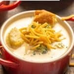 A bowl of homemade Black-eyed Pea broccoli cheese soup garnished with croutons.