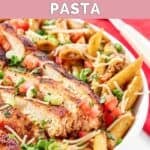 Homemade Chili's cajun chicken pasta on a large plate.