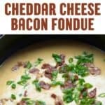 Homemade cheddar cheese bacon fondue garnished with green onions.