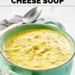 A bowl of homemade Jason's Deli broccoli cheese soup and a spoon behind it.