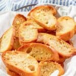 A serving basket filled with homemade Jason's Deli garlic toast.