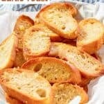 Homemade Jason's Deli garlic toast in a serving basket and a kitchen towel behind it.