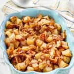 Lipton onion soup mix roasted potatoes and a serving spoon.
