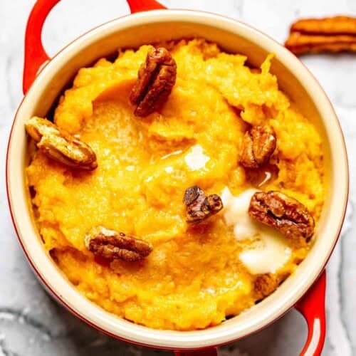 Copycat Red Lobster whipped sweet potatoes with honey roasted pecans on top.