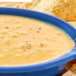 Spicy Rotel cheese dip and tortilla chips.