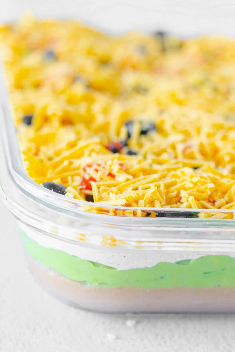 Side view of 7 layer dip showing the layers in a glass dish.