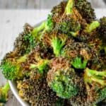 Air fryer broccoli piled in a small bowl.