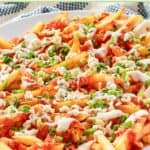 Homemade buffalo fries on a platter on a marble surface.