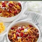 Cincinnati chili topped with kidney beans, cheese, and onions.