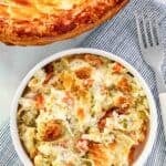 A creamy chicken pot pie with buttery crust ready to eat.