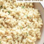 A bowl of creamy white cheddar mac and cheese.