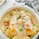 Creamy chicken pot pie soup in a bowl ready to eat.