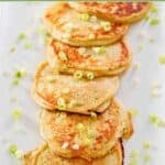 Crispy fried mashed potato pancakes topped with chopped green onions.