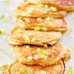 Leftover mashed potato pancakes garnished with green onions.