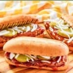Homemade McDonald's McRib sandwiches on a platter.