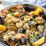 Homemade Silver Legacy Casino seafood pan roast on a marble surface.