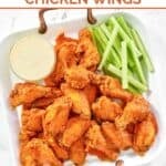 Homemade Wings and Things garlic buffalo chicken wings, celery sticks, and blue cheese dressing.