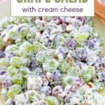 Red and green grape salad with walnuts and cream cheese dressing.
