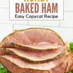 A homemade honey baked ham with slices cut from it.