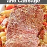 Instant Pot corned beef over cabbage, potatoes, and carrots on a platter.