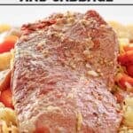 Corned beef over cooked cabbage, carrots, and potatoes.