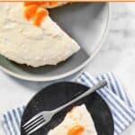 A cheesecake made with fresh mandarin oranges with a slice served on a plate.