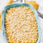 Freshly made creamed corn served in a rustic dish.