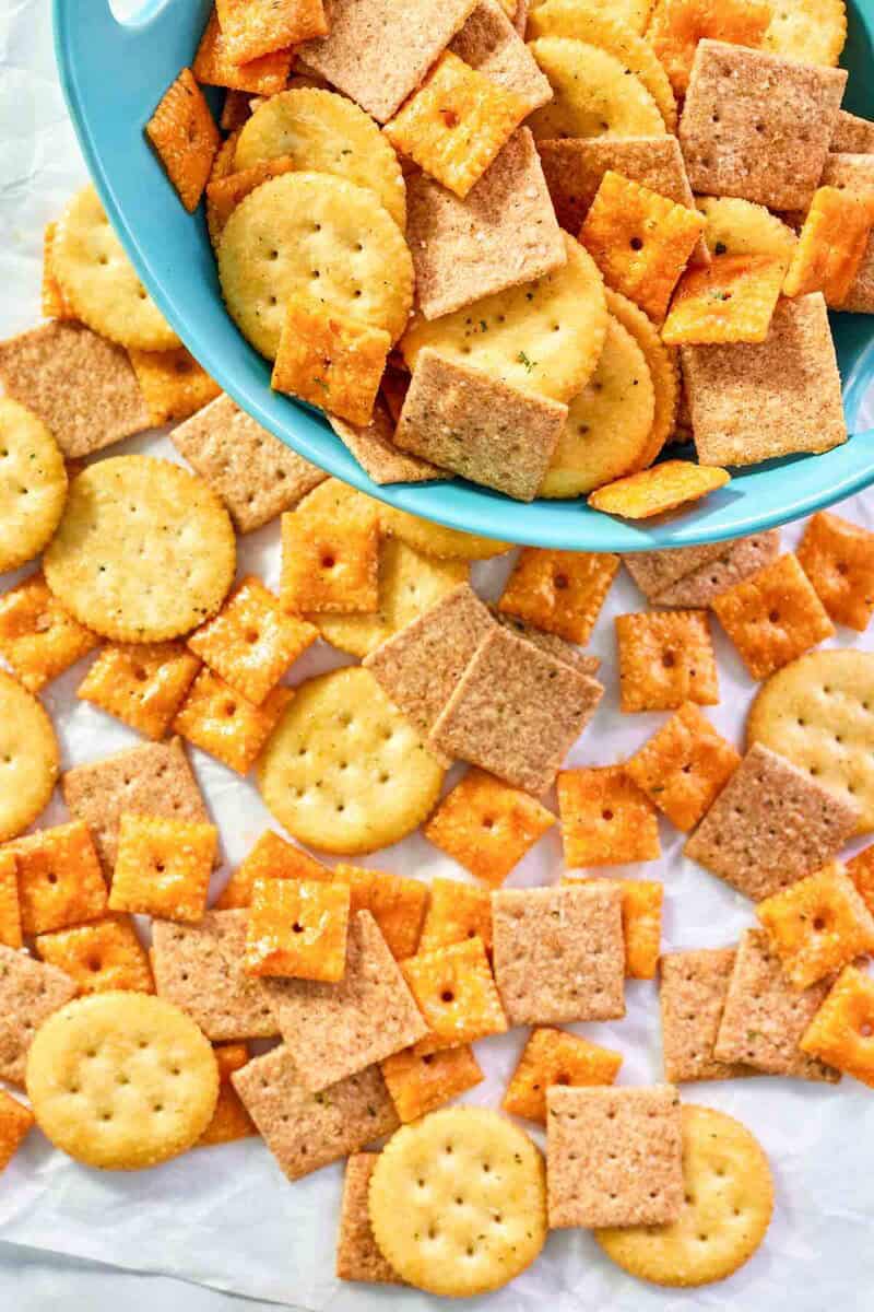 Mix of seasoned Ritz, Wheat Thin, and cheese crackers.