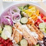 Homemade chicken fajita salad served with creamy salsa verde dressing.