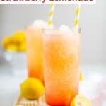 Two glasses of copycat McDonald's frozen strawberry lemonade on a wood board.