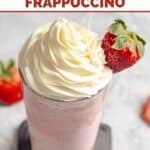 A homemade Starbucks strawberry frappuccino with whipped cream on top.
