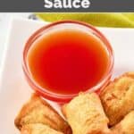 A bowl of homemade sweet and sour sauce beside egg rolls on a platter.