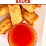 Egg rolls served with sweet and sour dipping sauce.