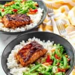 Grilled salmon with homemade teriyaki sauce and stir-fried veggies served over rice.