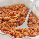 Homemade BBQ baked beans with bacon ready to serve.