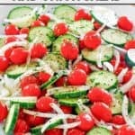 A platter of homemade Cracker Barrel cucumber tomato and onion salad.