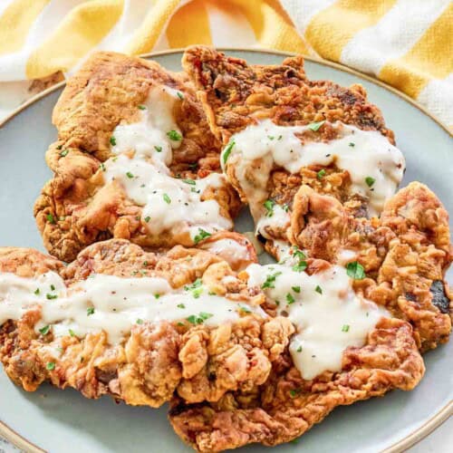 Crispy batter fried steaks topped with cream gravy.