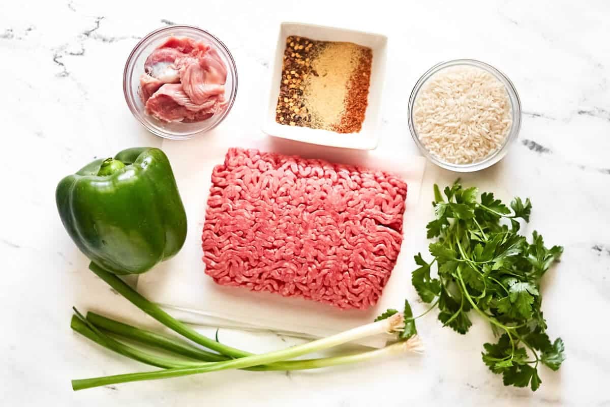Ground beef, chicken gizzards, rice, bell pepper, green onions, parsley, and seasonings..