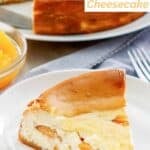 A slice of copycat Olive Garden peaches and cream cheesecake on a dessert plate.